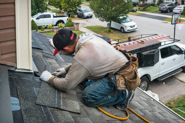 Professional Storm Damage Roof Repair technician working in Reading, MI
